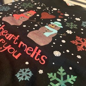 Charming Black Sweater with Snowman and Heart Design